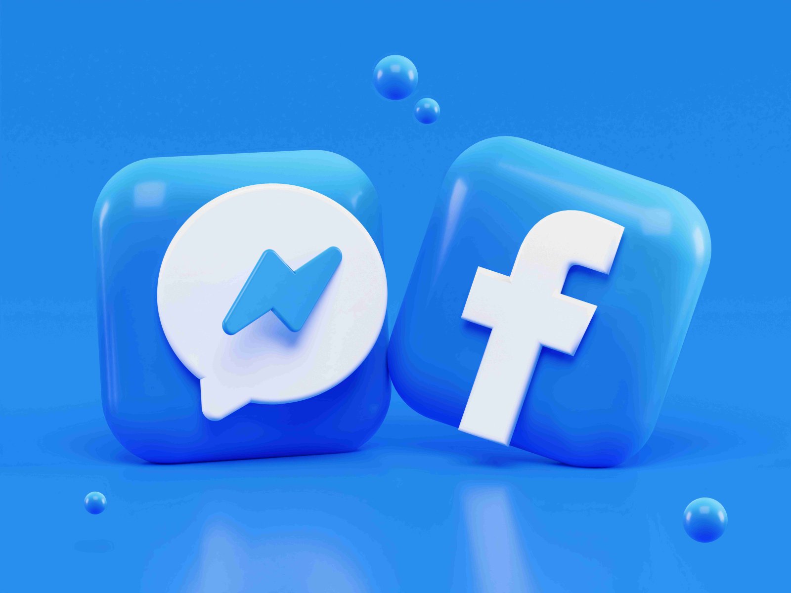 3D icons of Facebook and Messenger apps on a blue background, emphasizing social media marketing strategies for brand engagement in 2025.