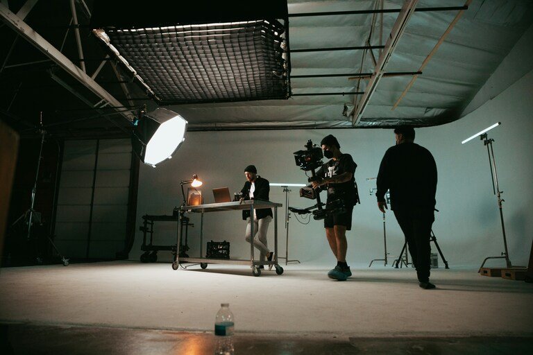 Behind the scenes of a studio based video shoot. This all add to the video production costs.